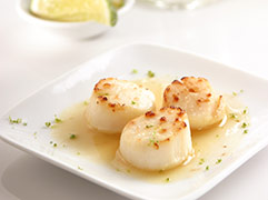 Broiled scallops with sweet lime sauce